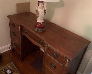 Knee hole desk, antique lamp