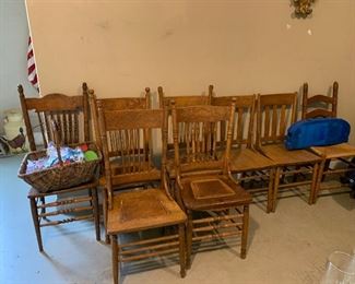 Several styles of oak chairs