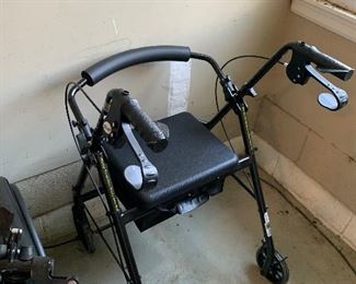 Rolling walker with seat -good condition