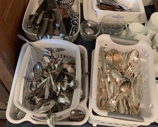 4 sets of stainless flatware
