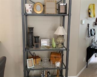 Etagere not for sale.  Assortment of decor items for sale.