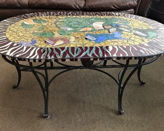THIS IS ONE OF THE PIECES MERIDETH MADE.  ABSOLUTELY STUNNING STAINED GLASS AND IRON COFFEE TABLE.
