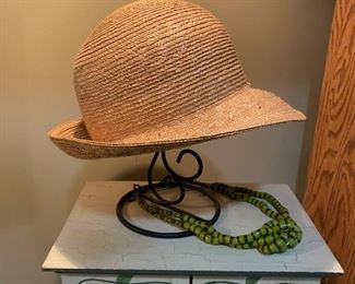 straw hats, stand not included