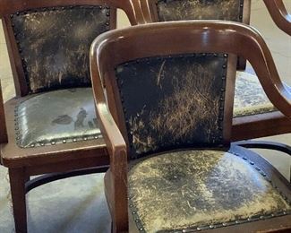 leather and wood chairs