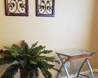 Glass top computer desk for $125,  greenery, arched wall decor