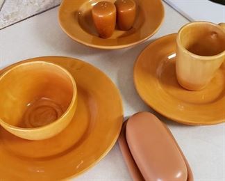 EveryWare Made in Mexico dinnerware.  8 plates, salad plate, salad bowl, soup bowl, coffee cups, salt/pepper and large tray.  Covered butter dish goes with but not part of the set.  All  $125.  Clay/orange color