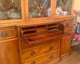 small drop front desk on the china cabinet 