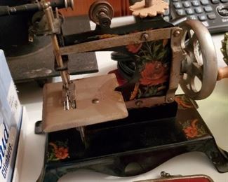 ANTIQUE TOY SEWING MACHINE