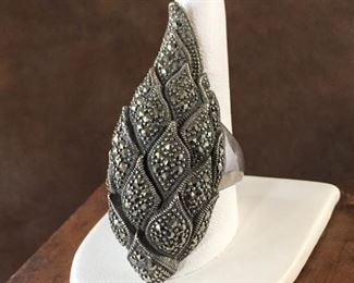 FIERCE size 9 1/2 statement ring. Sterling silver studded with marcasite. Stamped 925 inside band. $250
