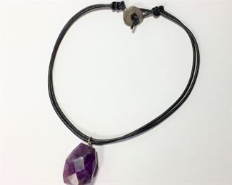 Boho 16 1/2" L black leather necklace featuring a huge faceted genuine amethyst pendant. Silver clasp signed ATHENS PROTASIS.  $60
