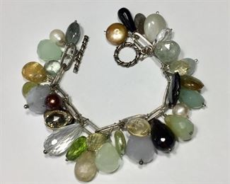 FABULOUS Sterling silver link bracelet studded with pearls and gemstones, including chalcedony, rock crystal, peridot, labradorite, citrine, aquamarine, jasper and smoky quartz. 6 3/4" long.  $220 
