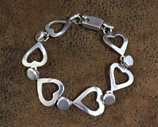 Gorgeous 7 1/4"  Mexico Sterling silver heart links bracelet with box clasp. Links are a bit over 5/8" W. Stamped STERLING 925 MEX.  $150
