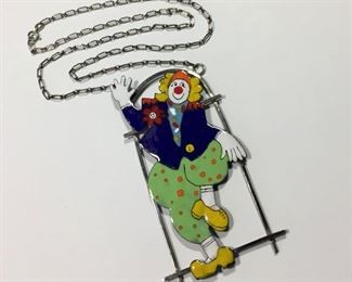 Huge, colorful designer Sterling silver and enamel clown pendant necklace. Sterling chain necklace is 20" long, pendant hangs down 3 3/4" and is 2 1/8" wide. Signed by artist - first name Sara, last name partially smudged but looks like Coast.  Stamped STERLING. $160
