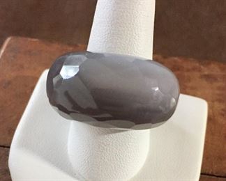 Size 8 3/4" gorgeous mod milky gray carved gemstone ring. Smooth on top, bottom and sides and faceted around the top edge - really cool! $120
