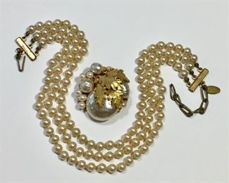 Gorgeous Miriam Haskell pearl necklace/brooch set. Triple strand necklace is 15 1/2"  and signed on hook clasp and on tag.  Brooch is 1 1/2" in diameter and is in amazing like new condition-looks like it was never worn!  Signed on back.  Necklace $150, Brooch $150, or set $260.
