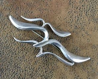 Lovely designer Sterling silver seagulls brooch.  4 3/8" x 1 3/4".  Stamped STERLING and signed PB on back. $125
