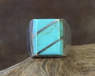 Size 10 1/2 Sterling silver and turquoise colored stone inlay ring.  Stamped MEXICO 925 inside band.  $80
