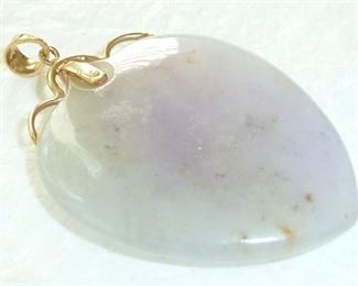 Beautiful lavender and pale green jade heart pendant set in 14k gold.  Measures 1 1/4", not including the bale. $135