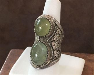 Size 7 1/2 massive woven sterling silver saddle ring featuring two gorgeous smooth prehnite cabochons. STUNNING!  $236
 