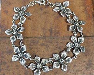 Sterling silver flower link bracelet. 7 1/2", stamped 925 THAI. Perfect for summer $98
