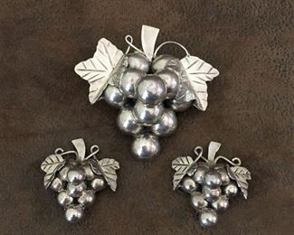 Large Taxco sterling grape cluster brooch/pendant and earrings. Brooch/pendant is 2 5/8" x 2 1/2", and signed MEXICO 925 and JG-106, price is $122.
Clip earrings are 1 3/8" x 1 5/8", stamped MEXICO TC-134 and 925, price is $78 .