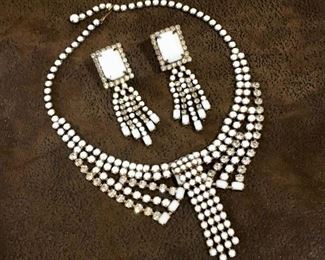 Collectible Designer vintage clear rhinestone & milk glass necklace and earrings set. Adjustable necklace length up to 16 1/2" long. Signed Hobe on the back of necklace. Matching fringe clip earrings are 3 inches long and 3/4" wide. $188 set.
