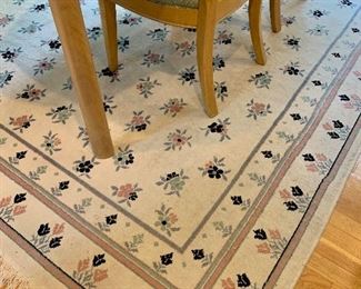 Item 32:  Cream rug with floral border - 94" x 126": $50