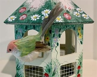 Small decorative bird house with red roses along the bottom: $8