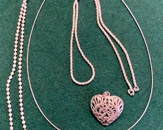 Lot of 3 sterling necklaces and a heart pendant: $20