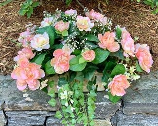 Faux pink flowers in pottery base: $14