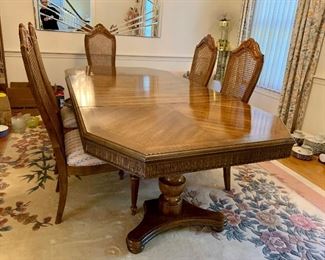 Item 46: Pentagonal Dining Table with 6 Chairs - this table is in impeccable condition and features pads for protection!: $475                                                                       
Chairs - 19" x 17" x 44.5" tall                                              
Table - 88 " x 42" x 29" tall  
