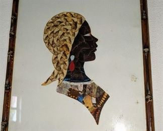 Made from Butterfly Wings  : Beautiful Portrait of an African Women . The detail in this piece of art truly can not be seen by this picture.  This is an original piece of art $75.00 .  African Republic and framed in Liberia  Each piece is signed by the creator of this Art 