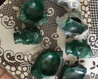 malachite gemstone animals and other figures carved from a mineral which is a copper ore, All pieces were purchased in in south africa. Pieces will be priced by size are animal. $25.00 up to $200