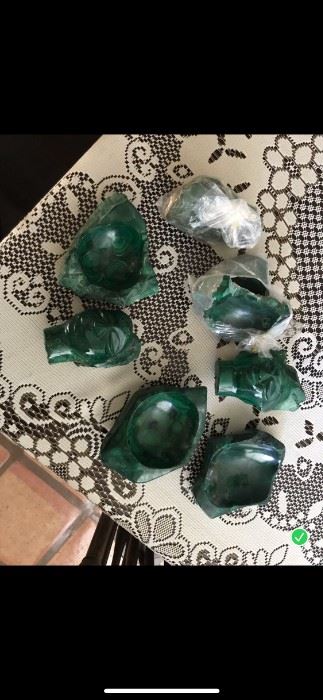 malachite gemstone animals and other figures carved from a mineral which is a copper ore, All pieces were purchased in in south africa.  Pieces will be priced by size are animal. $25.00 up to $200