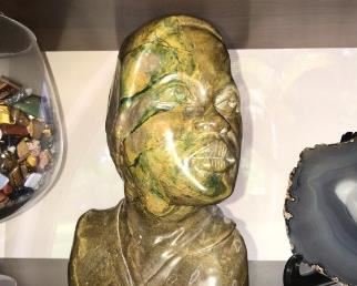 With a bright flash you can see the dark green and light green coloring . You can see the details of the carving . The art capture the beauty of the young women. Brown / Green/ Yellow Verdite Created by an Art from Zambia$450