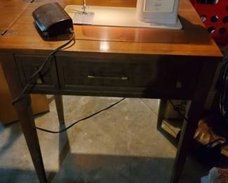 Singer Sewing Table with Singer Sew Machine . Powers on. Untested