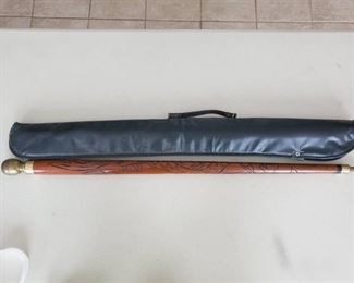 1 Vintage Wooden and Brass Tip Cane with A Dragon Carved on it. In Case