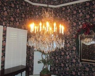 Beautiful 16 globe Chandelier.  No cracked or broken pieces.   Note:  you must be a professional to remove this fixture or hire a professional to remove the fixture for you. 
