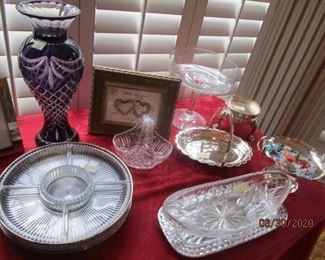 Silverplate serving pieces.  Cut Crystal serving pieces.  Glass candy pieces.  Cut crystal Floral vase.  