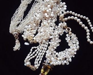 Examples of several types of fresh water pearl necklaces, including four more not shown.