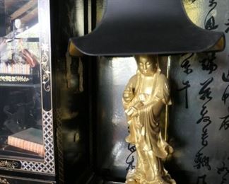 Pair of tall gold lamps with expensive black pagoda shades.