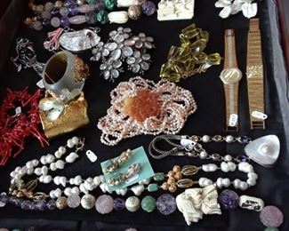 There is still a great selection of fashion jewelry in hard stones and glass, fresh water pearls, and novelty findings. 50% off case. Some jewelry will not be discounted.