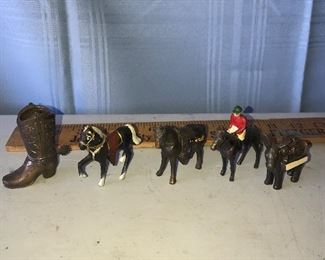 4 Metal horses and metal boots $10.00 for all 