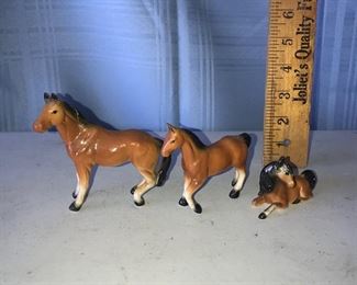 Three porcelain horses $8.00 for the set