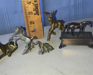 5 metal horses. The one on the right is a pencil sharpener $12.00 for all