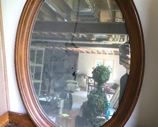Oval wooden mirror