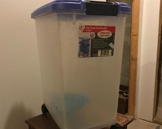 Pet food container on wheels
