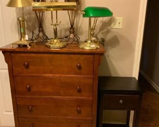 Front Bedroom: Five drawer chest in great condition, one drawer table, collection of desk lamps