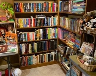 Back bedroom: Two huge bookcases for sale.  Lots of adult, teen, children, and infant books.  Military books.