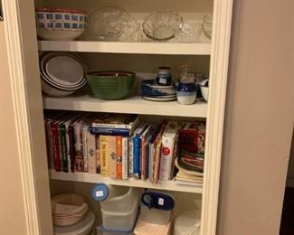 Den: Rose bowls, large decorative glass bowls, blue and white pottery, cook books, Tupperware